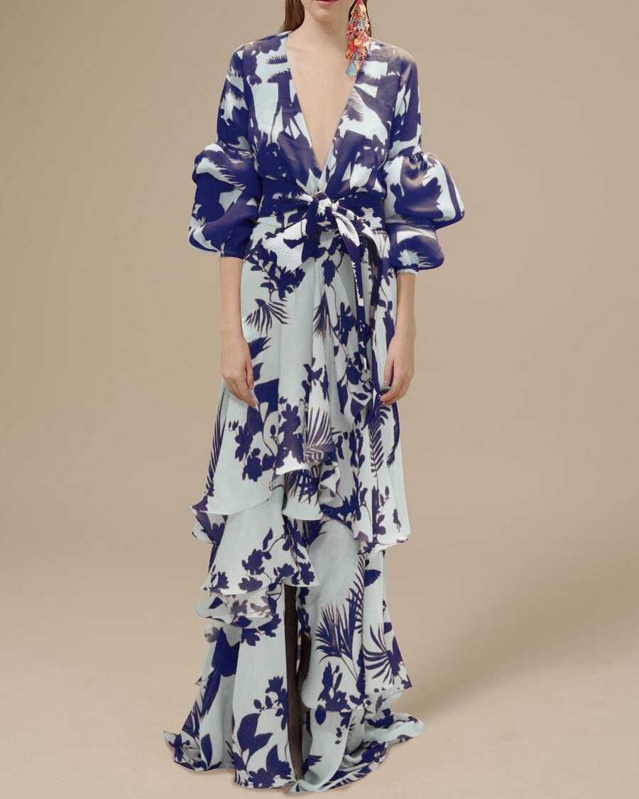 Full front view of pale blue and navy tropical print belted maxi dress with tiered skirt