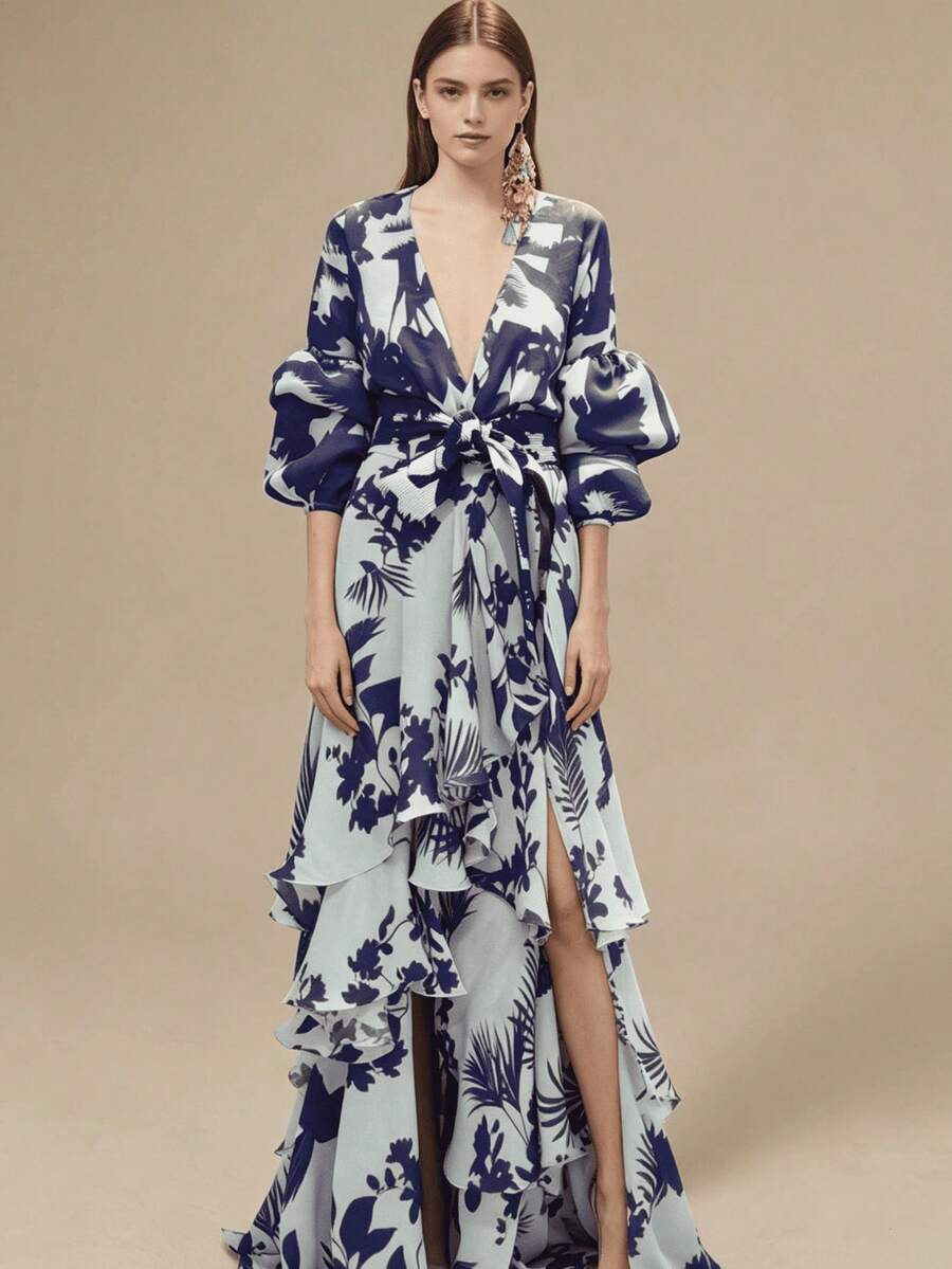 Front studio view of navy botanical wrap maxi dress with deep V-neck and ruffled hem