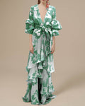 Full front view of pale blue and green botanical print belted maxi dress with kimono sleeves