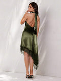 Back view of dark green satin halter mini dress with open back and long neck ties