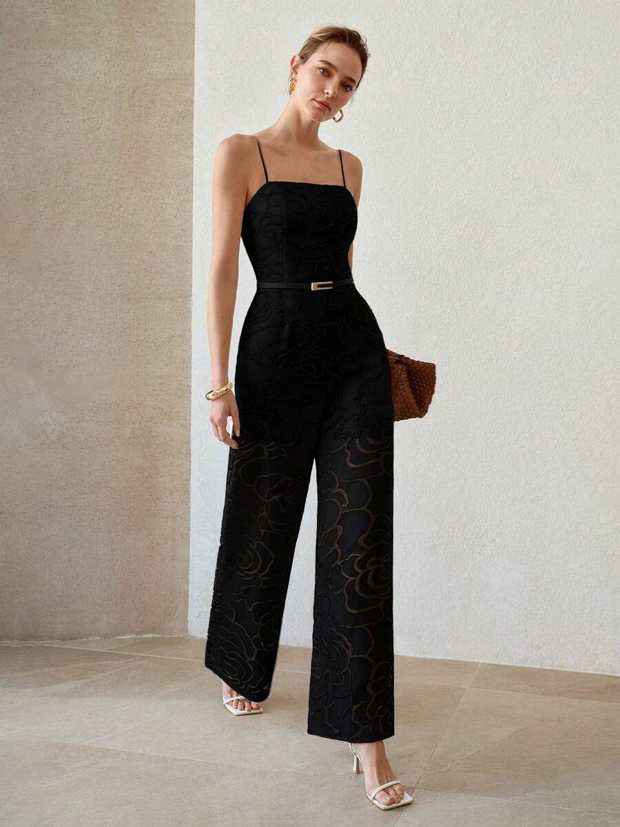 Full front view of black tonal floral wide-leg jumpsuit styled for an evening event