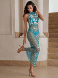 Front walking view of mint blue floral crochet swim cover-up worn over tonal beachwear
