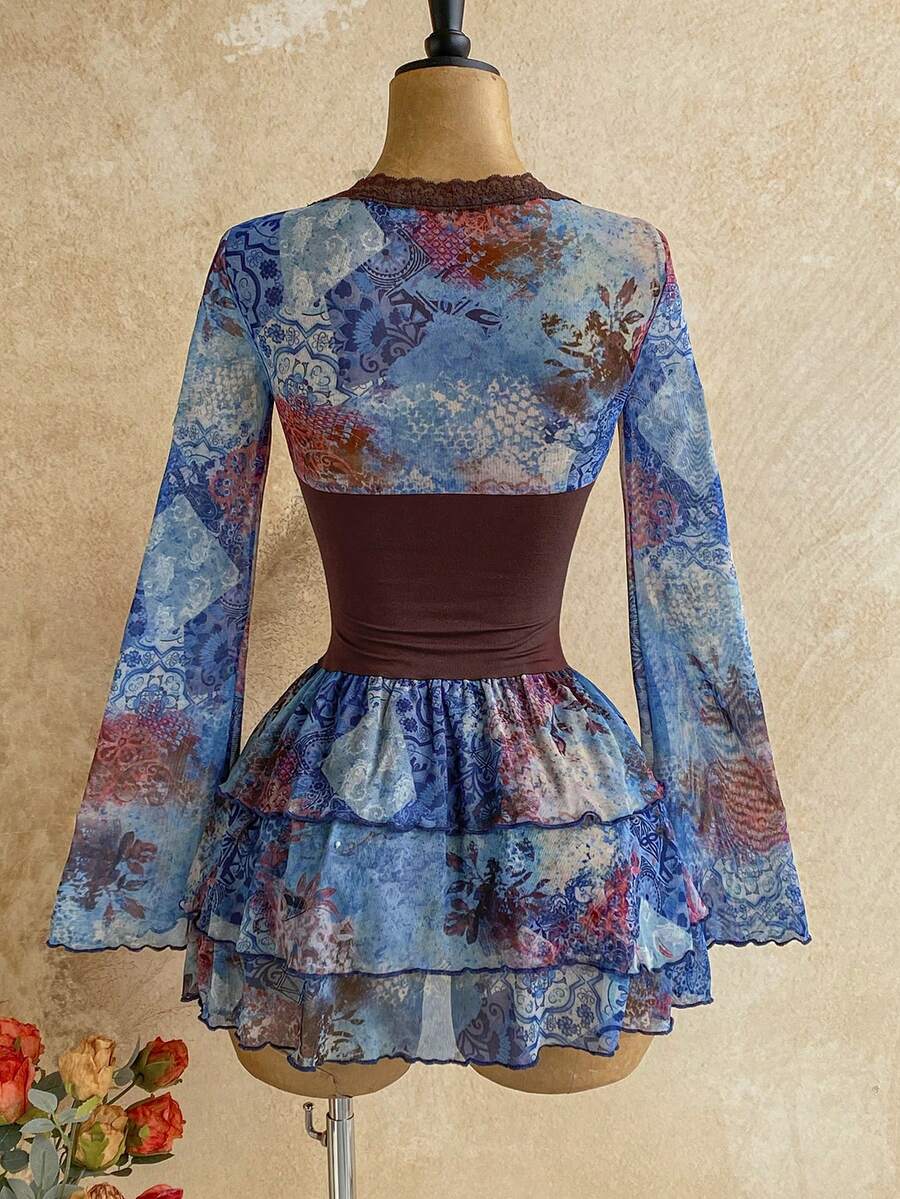 Front view of boho floral mini dress with fitted brown bodice and tiered ruffle hem