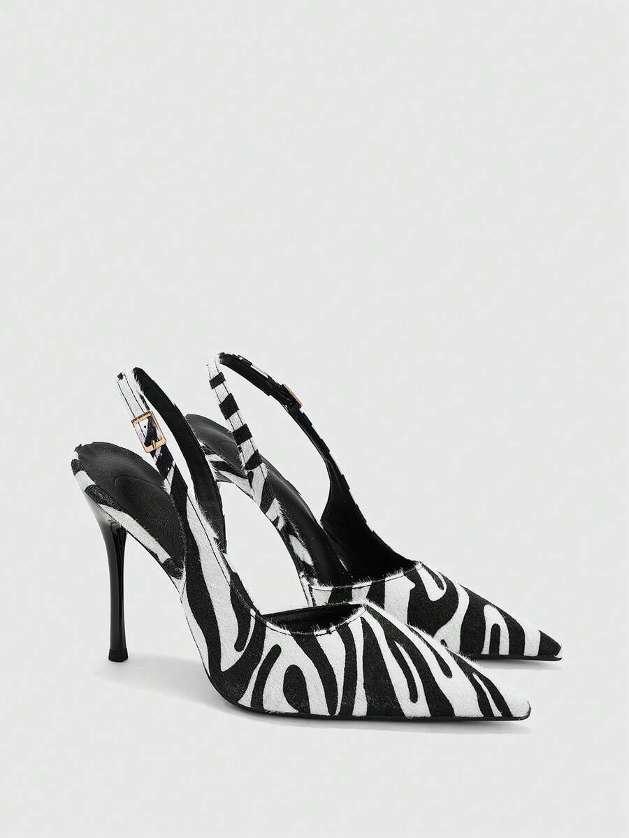 side view of black and white animal print slingback stiletto heel