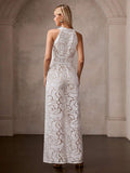 Back view of ivory 3D floral wide-leg jumpsuit with fitted bodice and concealed zipper