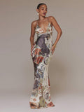 Front view of mixed animal and floral print sleeveless satin maxi dress