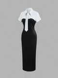Black white bodycon midi dress with short sleeves and front tie detail