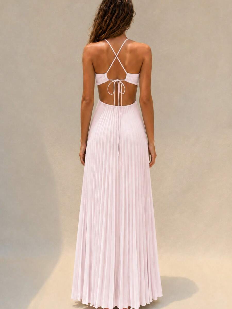 Mint green pleated halter maxi dress at beach resort, front view