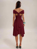 Black ruched two-piece set with open back tie detail and gathered skirt