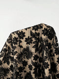 Close-up front view of black eyelash lace corset bodice with boning