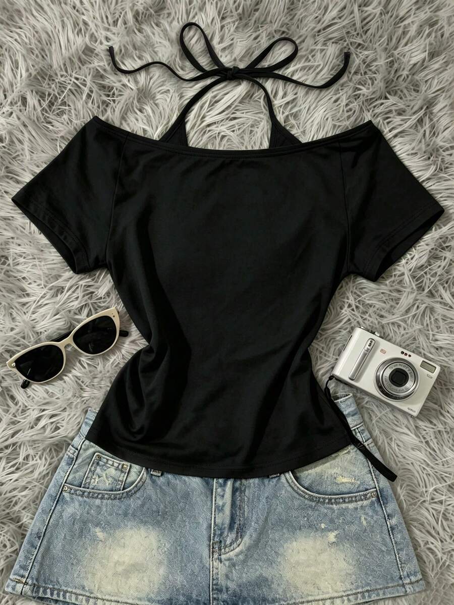 Alternate flat lay of black fitted off-shoulder halter top with denim skirt