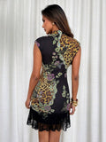 Rear studio view of multicolor fitted mini dress with mixed floral leopard print and black lace flounce