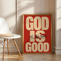 Framed God Is Good vertical canvas print with black script lettering