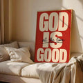Framed God Is Good Christian wall art in a styled room setting