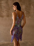Back view of lavender sequin swim cover-up with deep V back, sheer mesh, and fringe hem