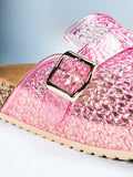 Close-up of pink jelly clog buckle and hollow woven PVC upper