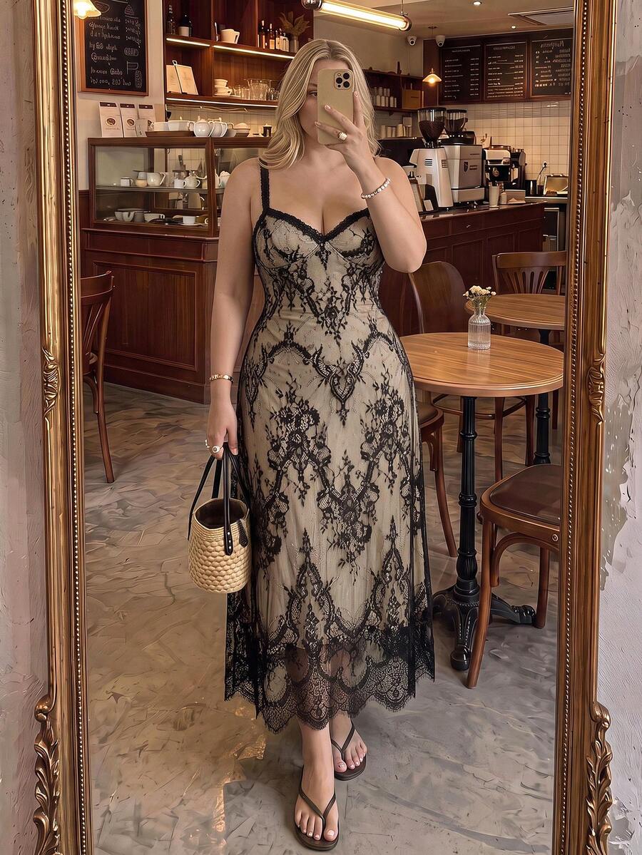 Front three-quarter view of black and nude floral lace slip dress styled for cocktail wear