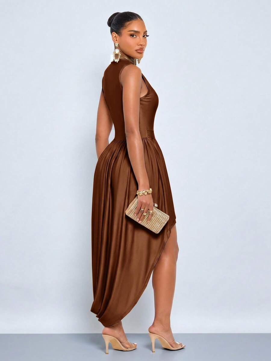Full front view of brown sleeveless maxi dress with pleated bodice and asymmetric side opening
