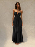 Orange pleated halter maxi dress with ruched bust, front view