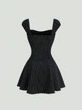 Black striped mini dress with short puff sleeves and fitted waist