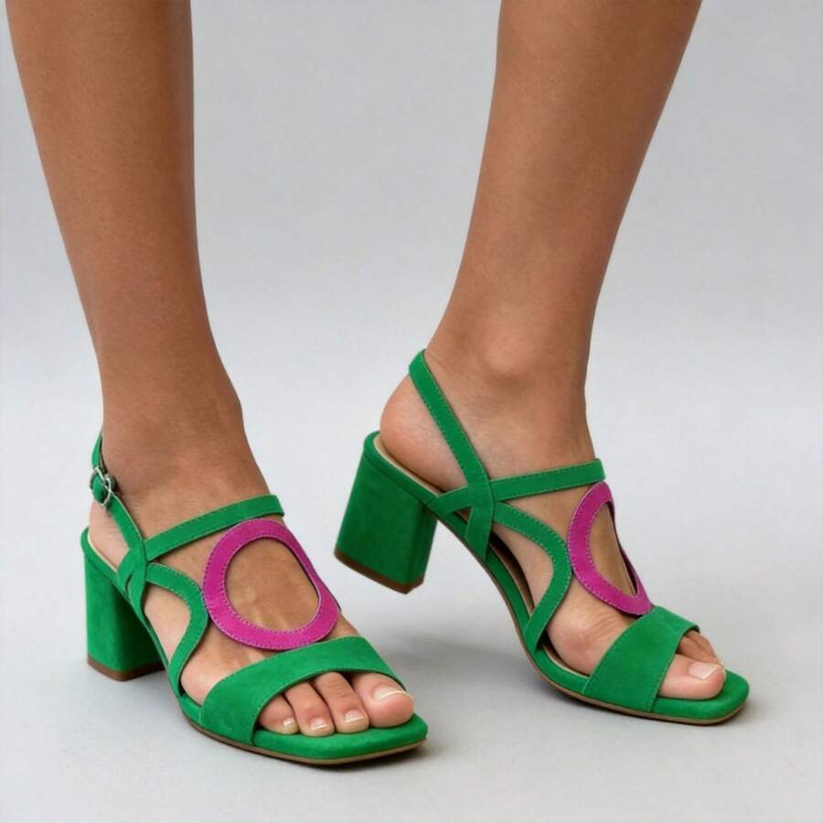 Three-quarter view of green and rose red round buckle block heel sandals on model