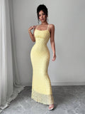 Full front view of light-yellow spaghetti-strap mermaid evening gown