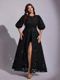 Back view of black floral devoré puff-sleeve maxi dress