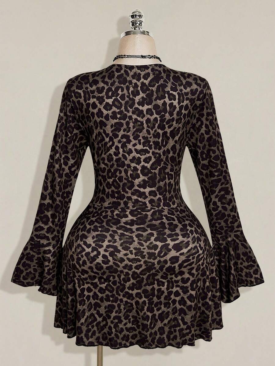 Front view of brown leopard print mini dress with black lace V-neck and long flared sleeves