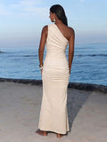 Back view of cream beige one-shoulder ruched bodycon maxi dress for beach vacation styling