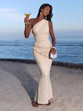 Full front view of cream beige one-shoulder ruched bodycon maxi dress for beach vacation styling