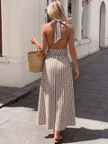 Back view of brown plaid backless maxi dress with tie-back detail