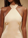 Close-up of ivory high halter neckline with wide halter panels and front seams