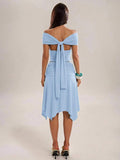 Yellow two-piece skirt outfit with open back tie and handkerchief hem