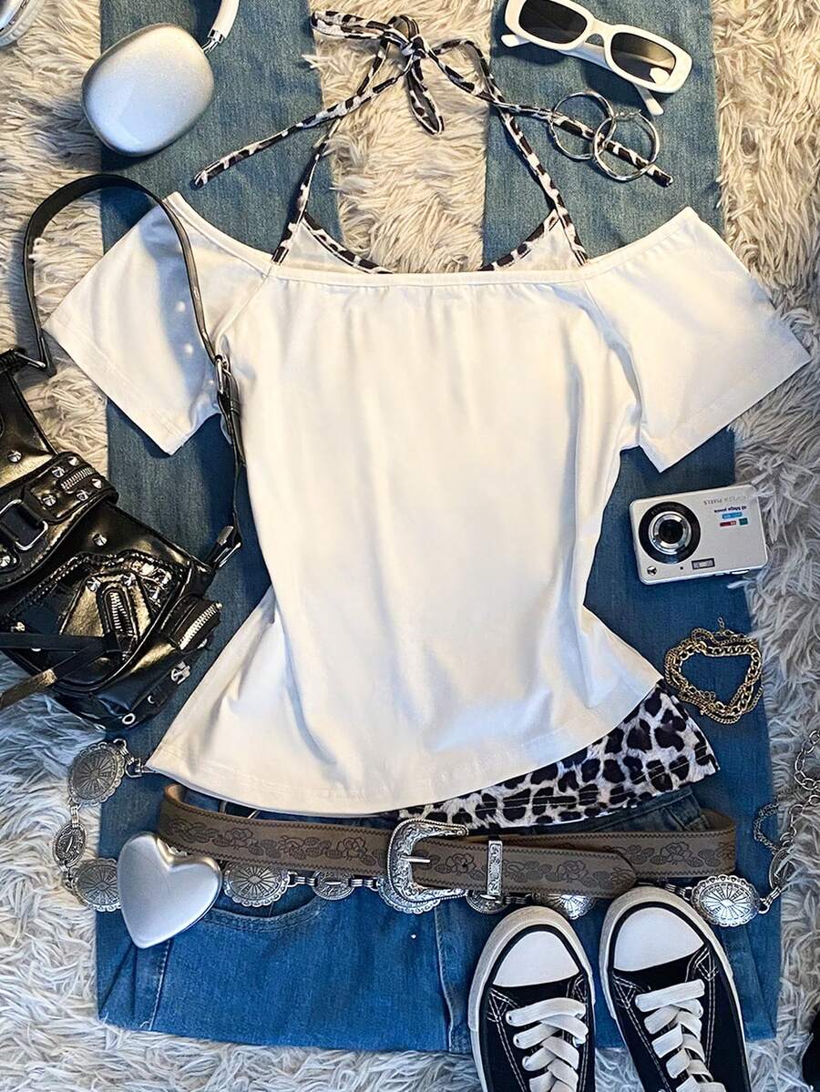 Back flat lay of white short-sleeve top with leopard-print halter insert and plain outer layer