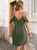Back view of blue cold shoulder mini dress with V-shaped back