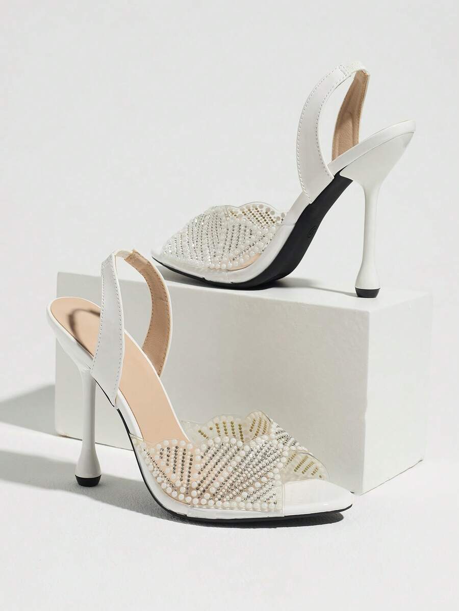 White peep-toe pearl and rhinestone mesh slingback with high flared heel