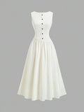 Ivory maxi dress with striped bow sash and front buttons