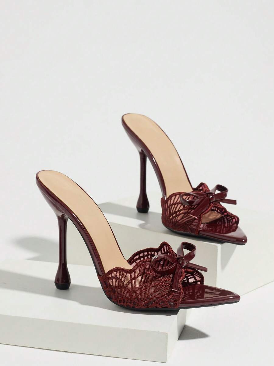 Burgundy bow-lace pointed open-toe mule pair with flared stiletto heels