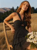 Side view of sleeveless A-line chiffon mini dress with flared tiers