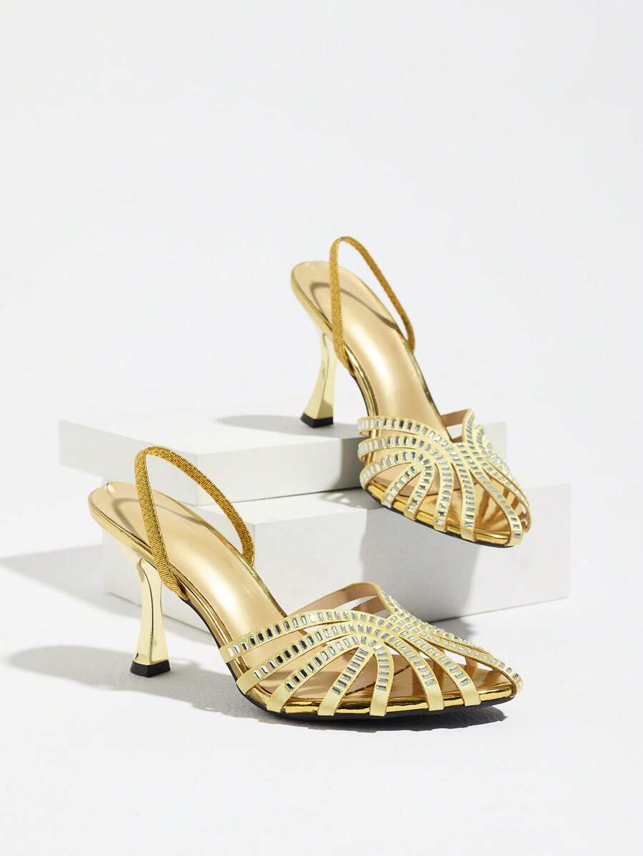 Gold open-toe flared-heel sandal with rhinestone straps