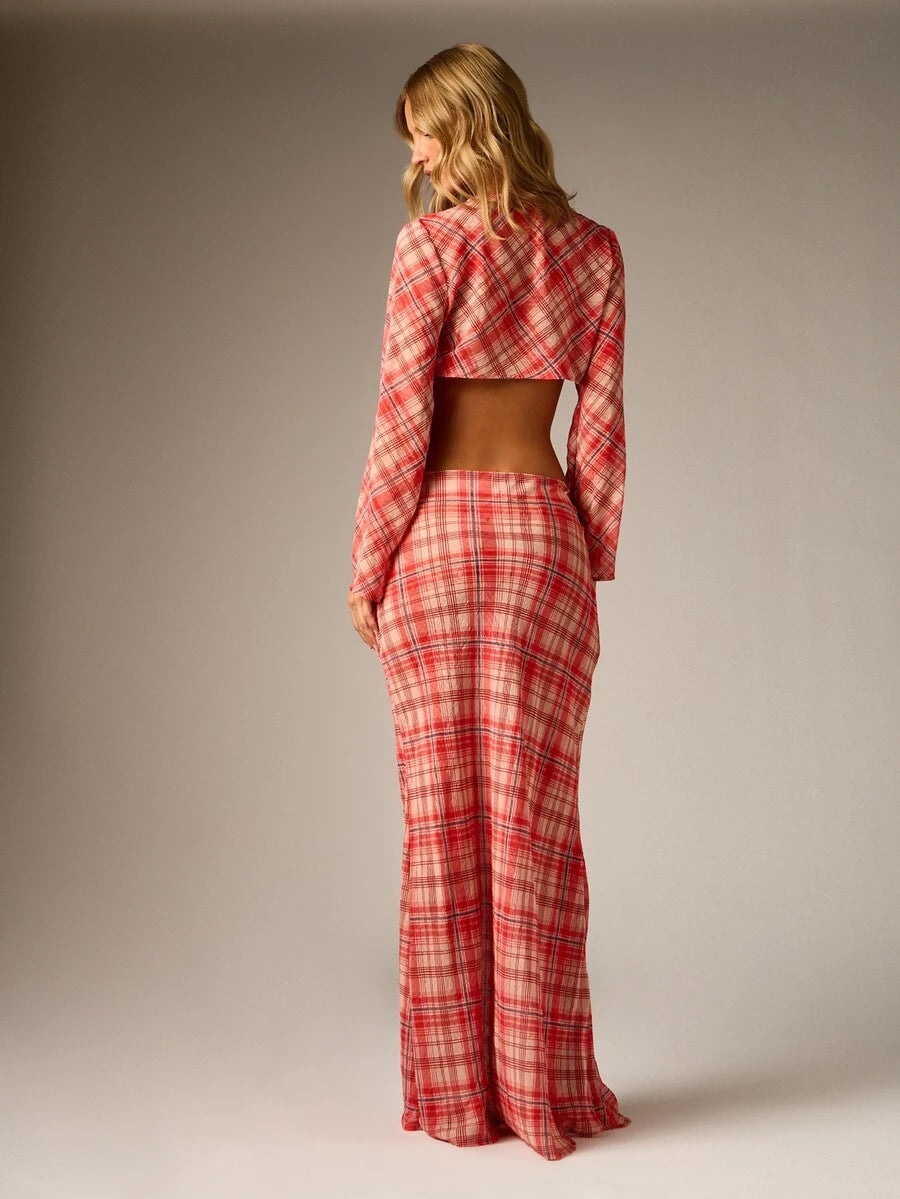 Rear view of the matching red plaid crop blouse and floor-length skirt showing the coordinated back