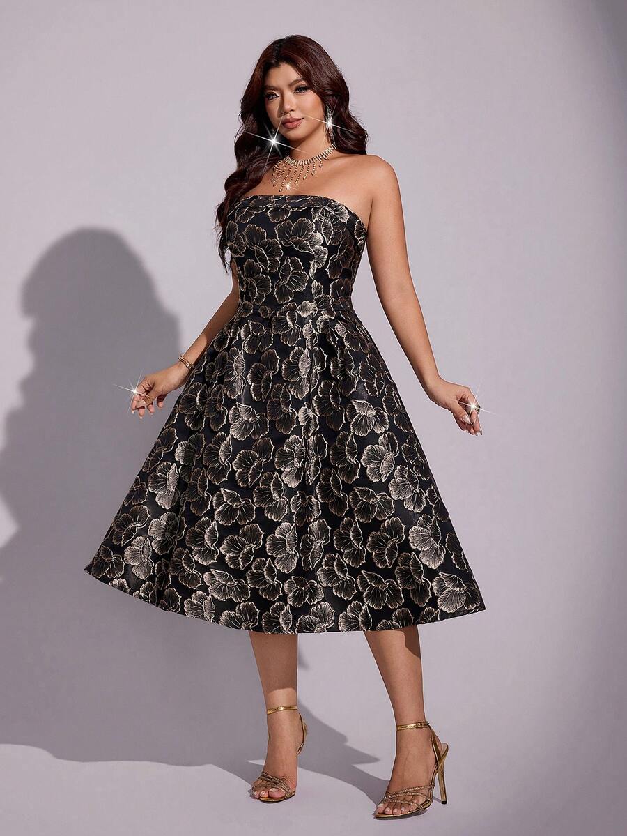 Side view of black floral jacquard strapless midi dress with cinched waist
