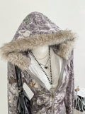Front detail of taupe camo zip-up hoodie with ribbed hem and faux-fur hood