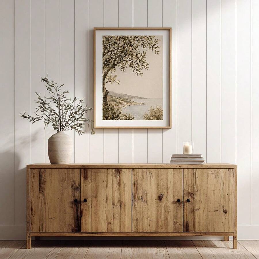Neutral framed olive tree and coastal landscape print above a wooden console, part of a Psalm 46:10 scripture canvas gallery set