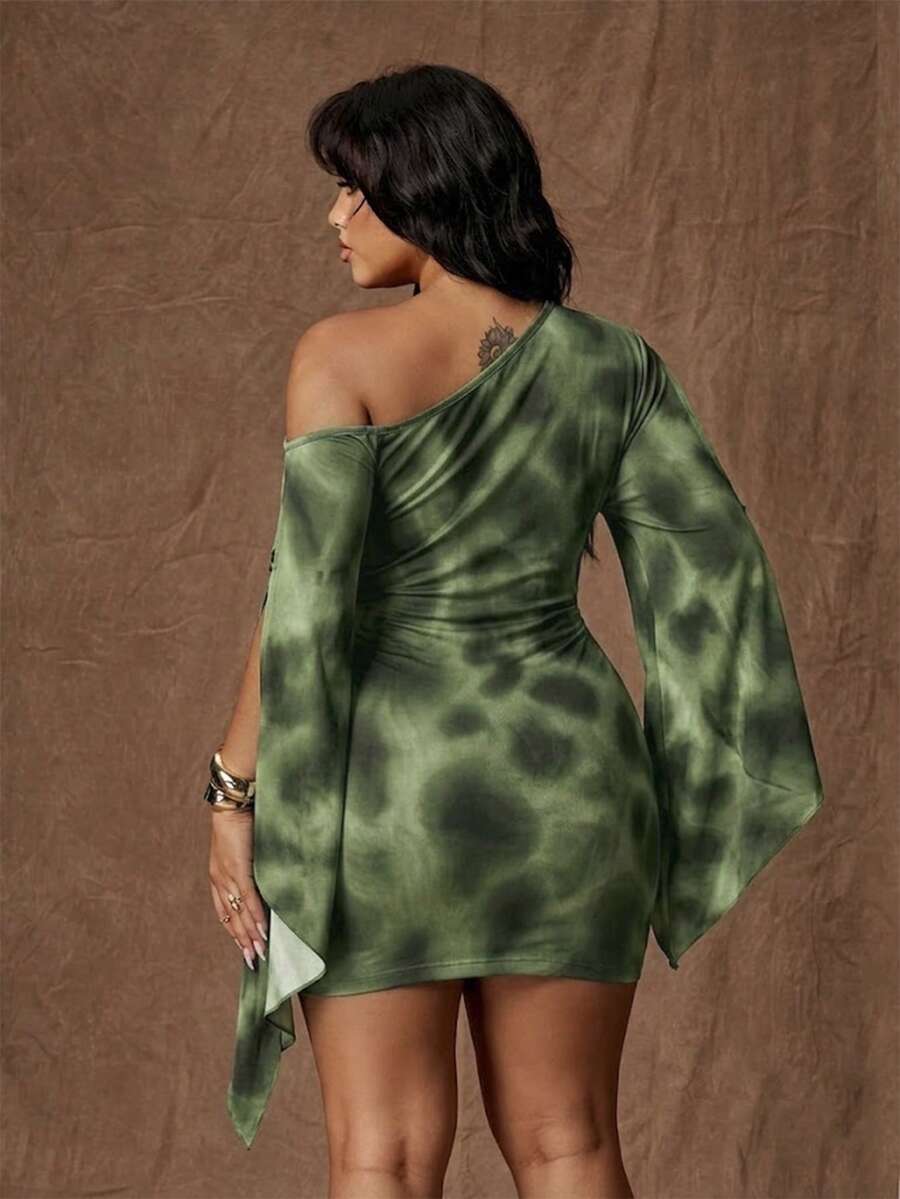Back view of green tie-dye mini dress with asymmetric shoulder and draped sleeves