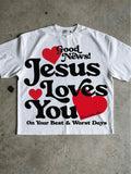 White Good News Jesus Loves You graphic T-shirt front flat lay