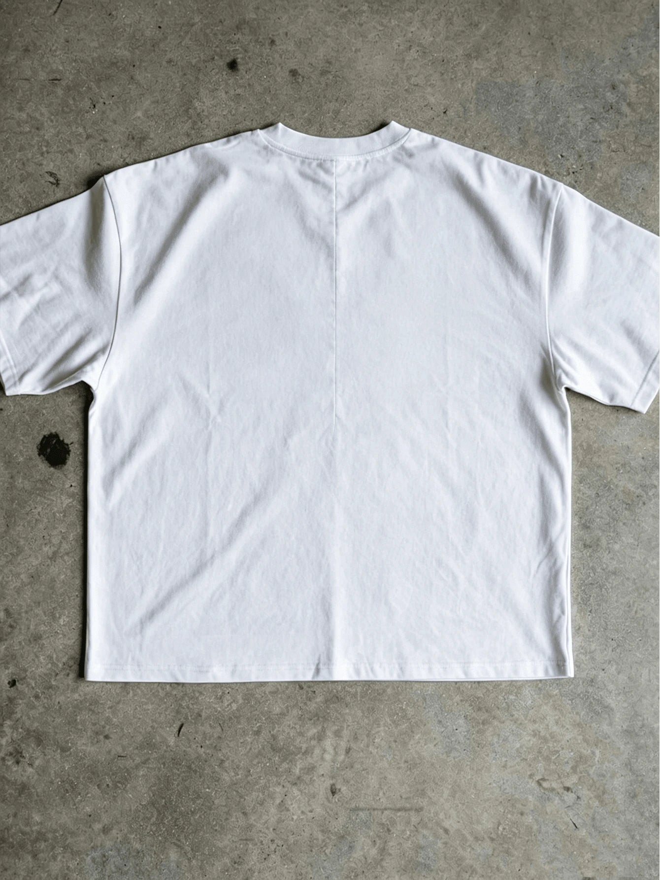 Plain back view of white Good News Jesus Loves You T-shirt