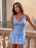 Light blue formal mini dress with sculptural feather hem