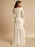 Back view of an ivory botanical lace maxi dress showing the fitted waist, long sleeves and floor-length skirt