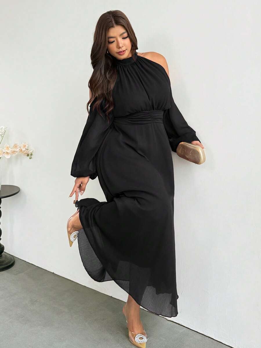 Angled front view of black plus size cold-shoulder halter maxi dress